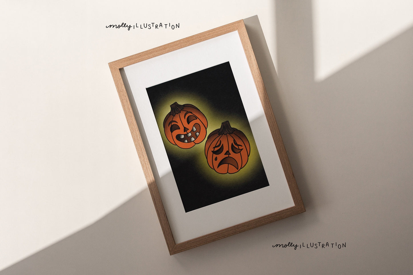 an illustrated art print of cartoon drama and comedy masks carved into pumpkins.