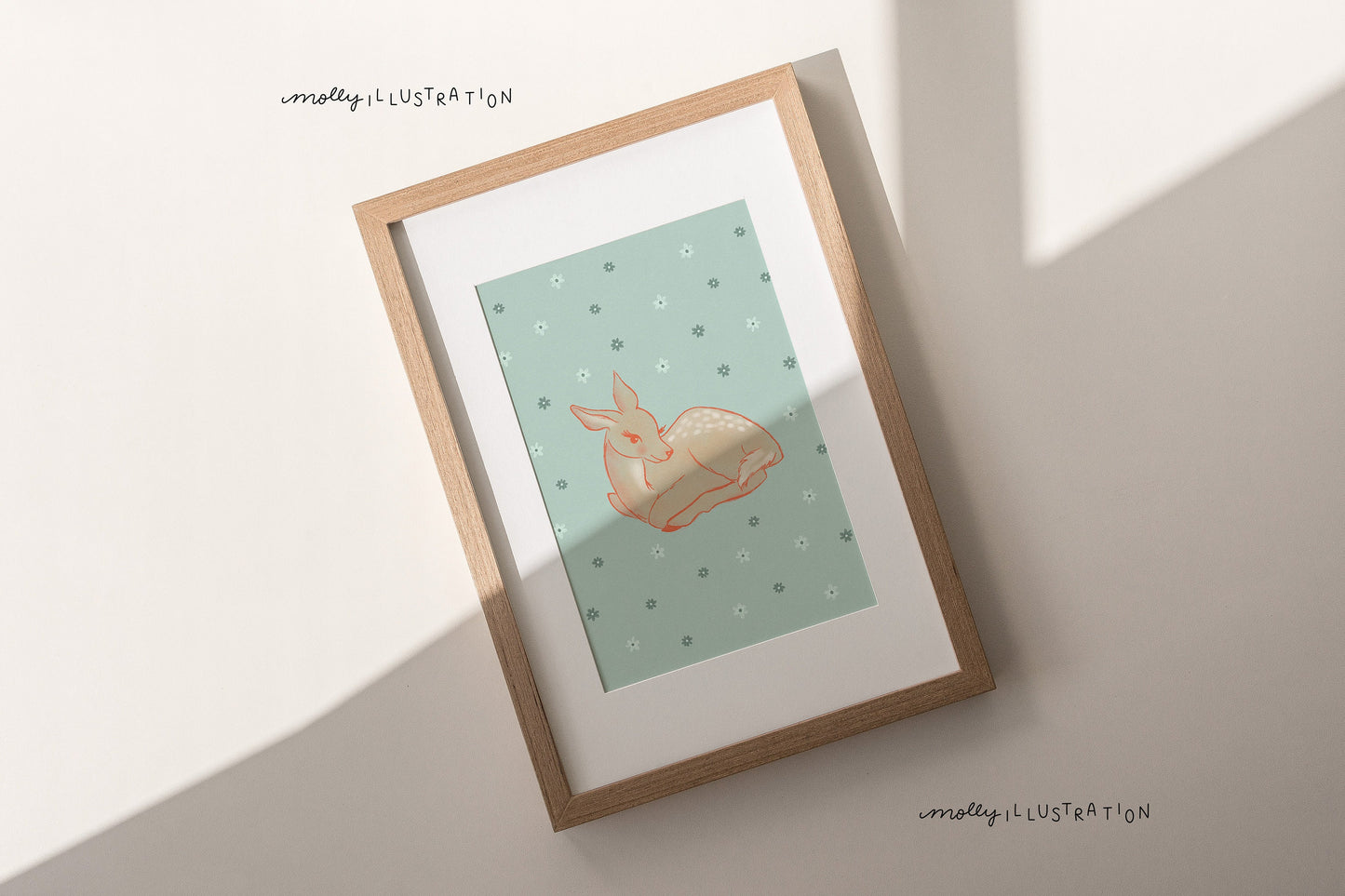 an illustrated art print of a cartoon deer with a light blue background filled with a pattern of small flowers