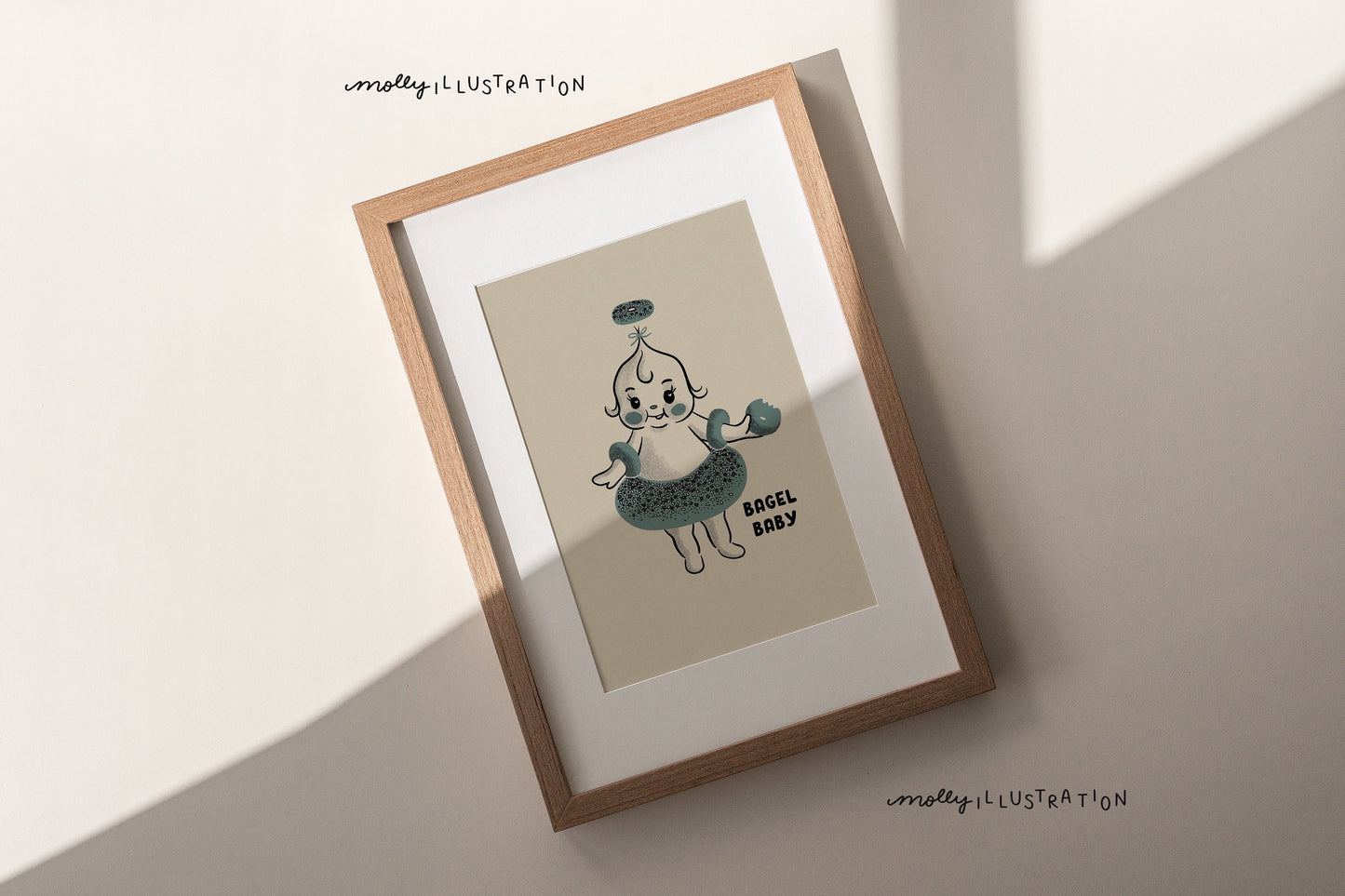 An illustrated art print of a cartoon bagel baby.
