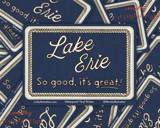 a blue rectangular vinyl sticker that reads "Lake Erie, So good, it's great!" in off white lettering with an illustrated rope border.