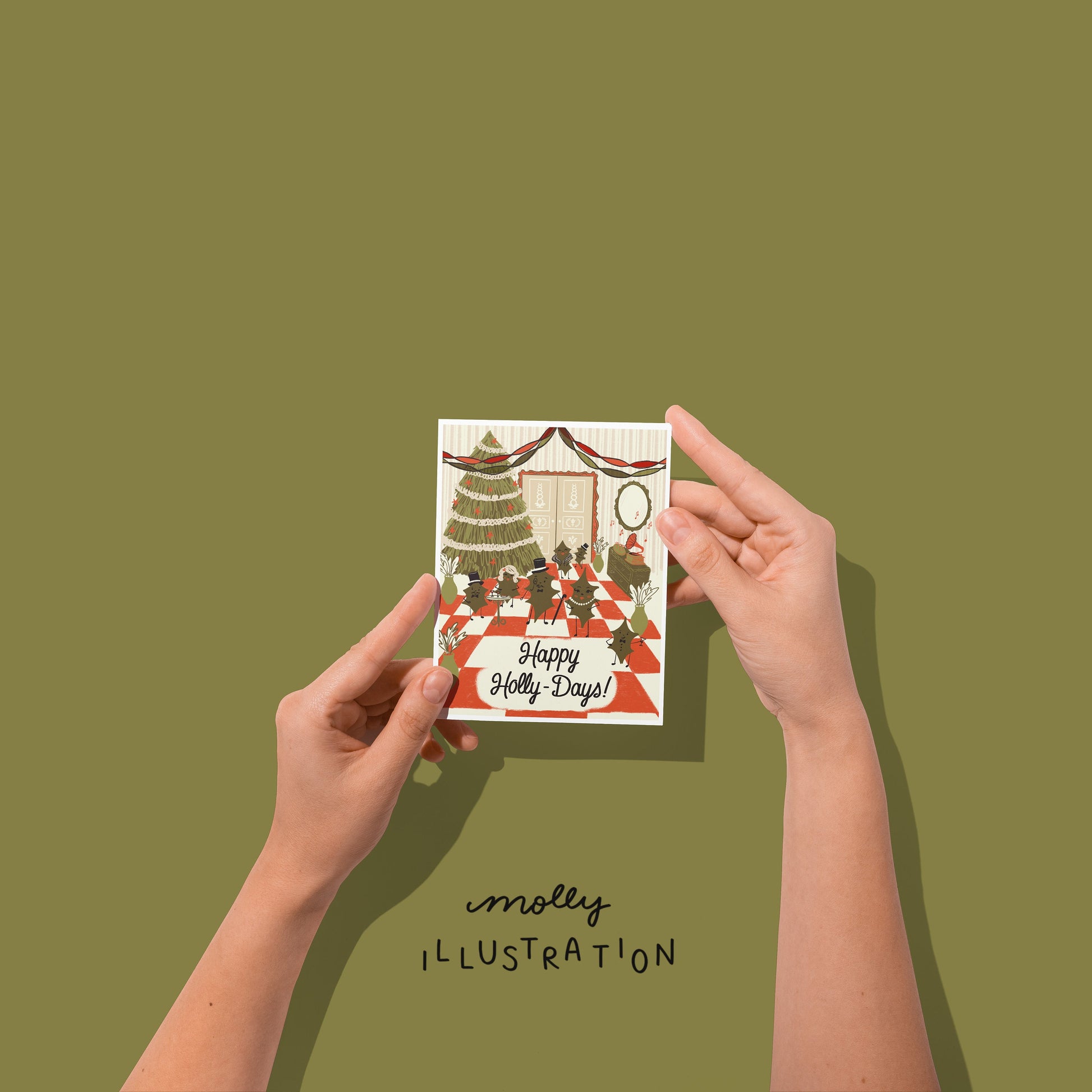 hands holding an illustrated greeting card that reads "Happy Holly-days!" beneath a room full of cartoon holly leaves celebrating at a fancy party