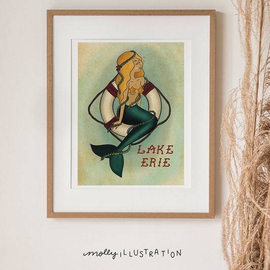 an illustrated art print that shows a pin up girl mermaid that reads "Lake Erie."