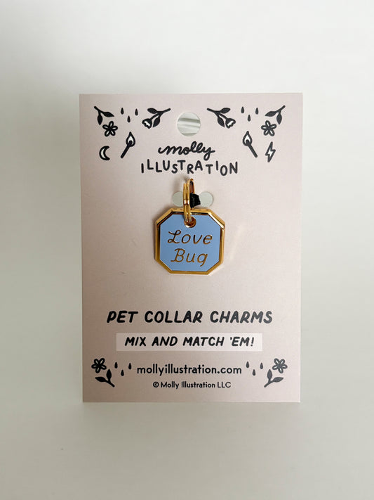 Pet collar charm with 'Love Bug' on a Molly Illustration branded card.