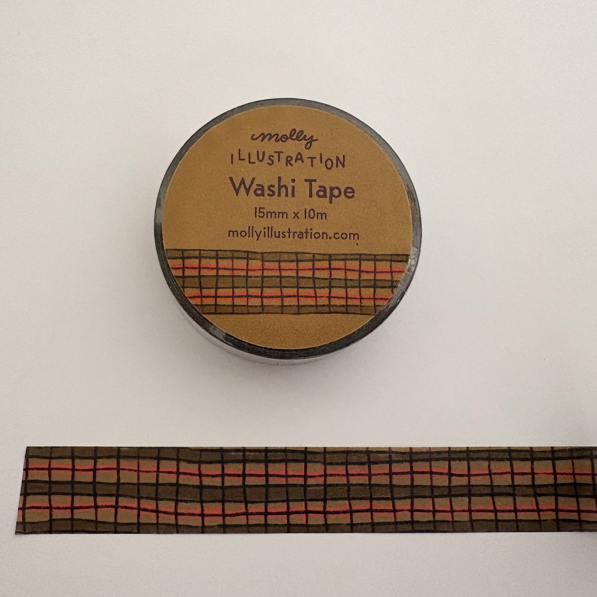 Dark green and red wonky plaid washi tape on a white background.
