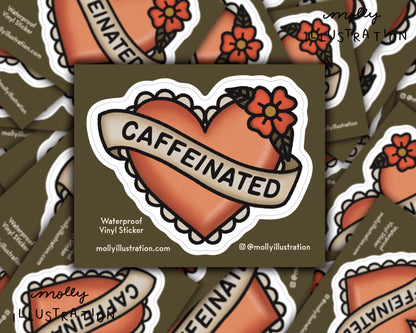 A waterproof kiss cut vinyl sticker that reads “Caffeinated” in a cartoon heart.