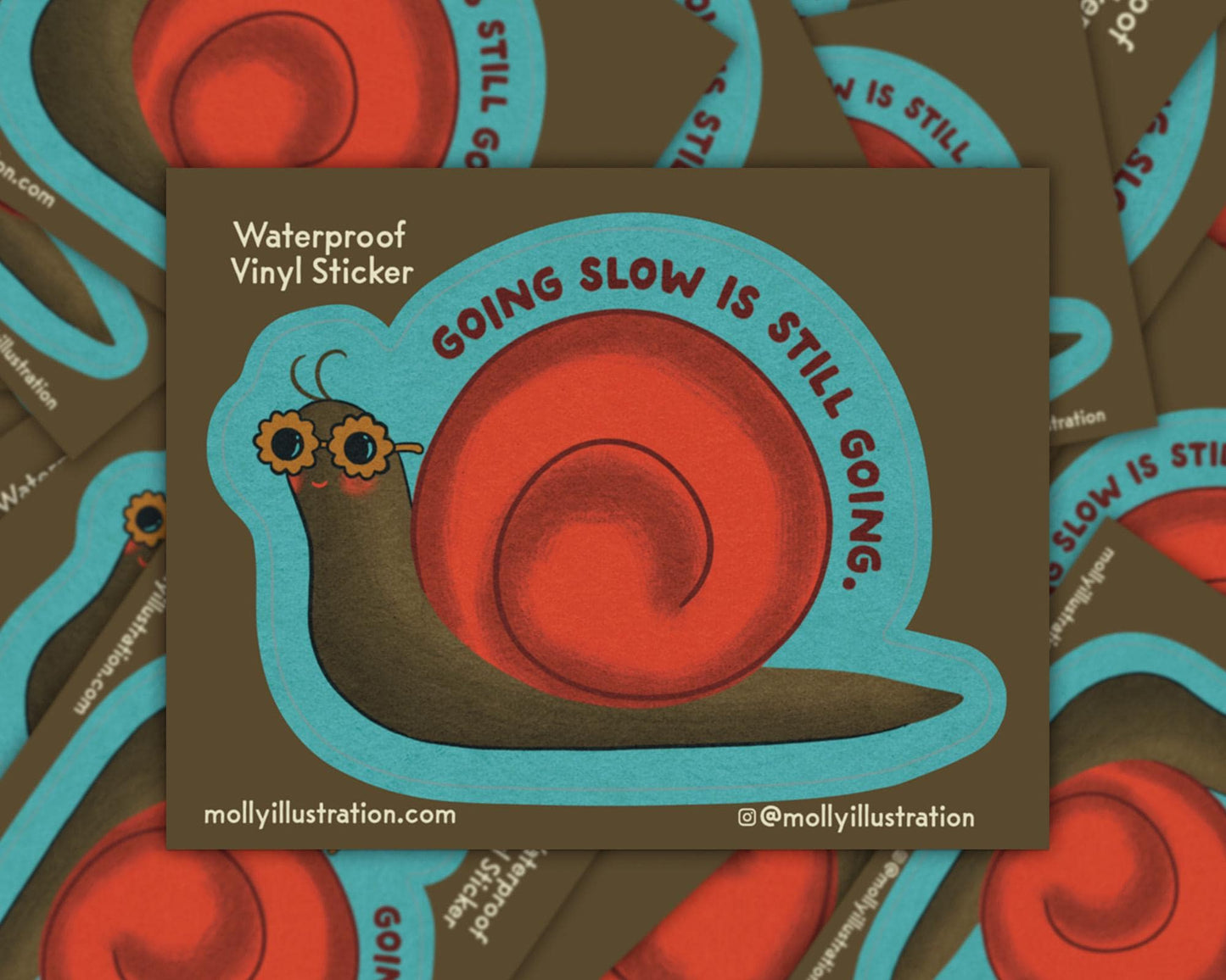 A waterproof kiss cut vinyl sticker that reads “Going slow is still going.” Above a cartoon snail.