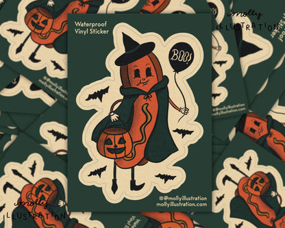 a kiss cut waterproof vinyl sticker of a Halloween Hot Dog (halloweenie) dressed as a witch and holding a jack o lantern bucket.