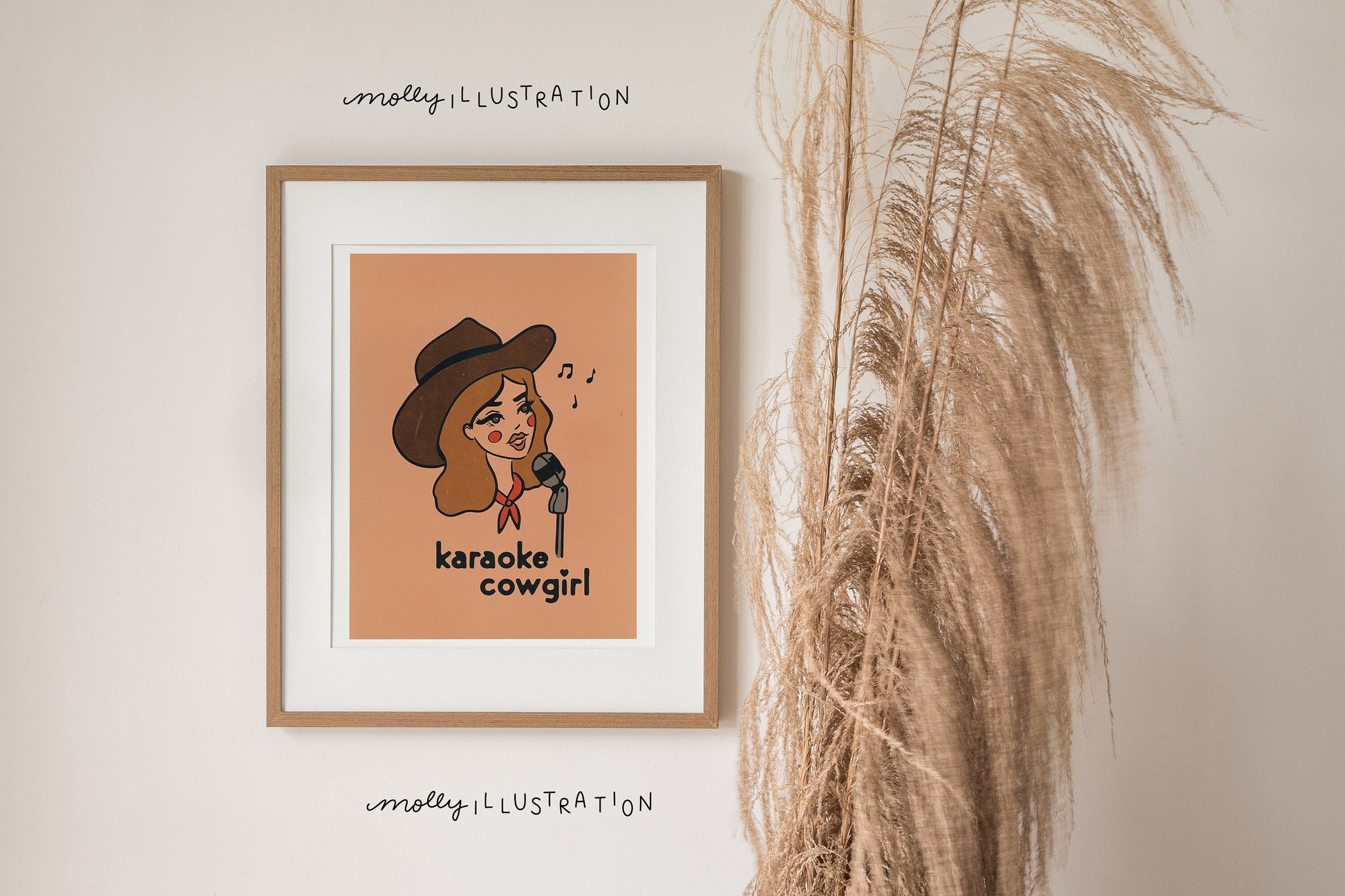 an art print of a cartoon cowgirl singing into a microphone. beneath her reads "karaoke cowgirl"