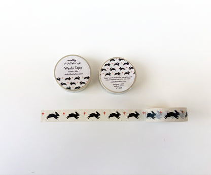 Two rolls of washi tape with rabbit designs on a white background
