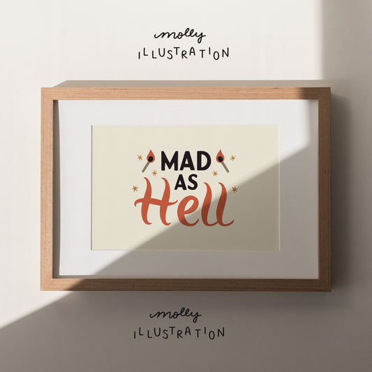 An art print that reads "Mad as Hell"