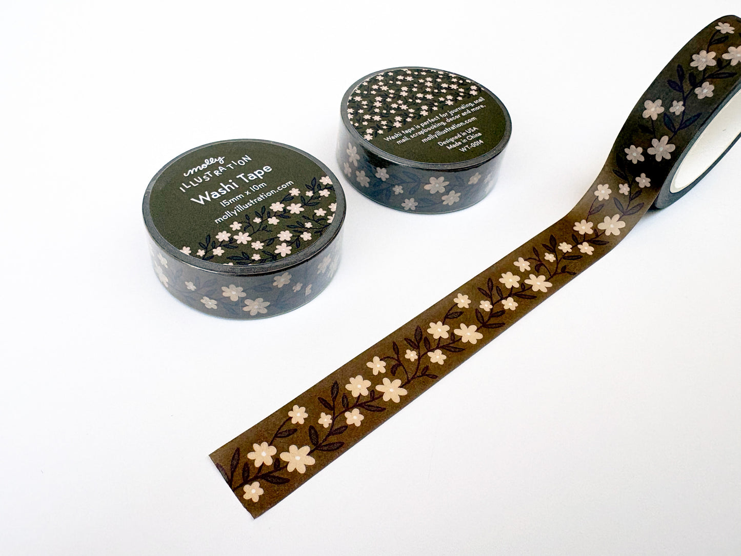 Floral-patterned washi tape with two containers on a white background