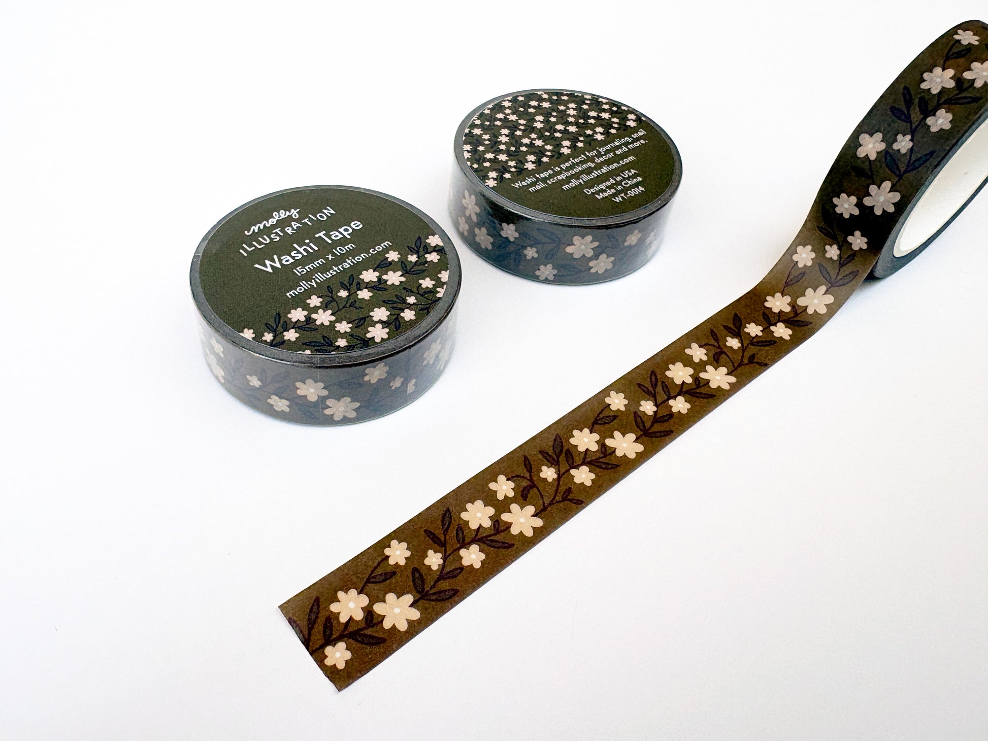 Floral-patterned washi tape with two containers on a white background