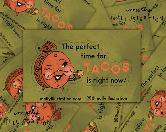 an illustrated waterproof vinyl sticker of an alarm clock holding a taco and text that reads "the perfect time for tacos is right now!" 