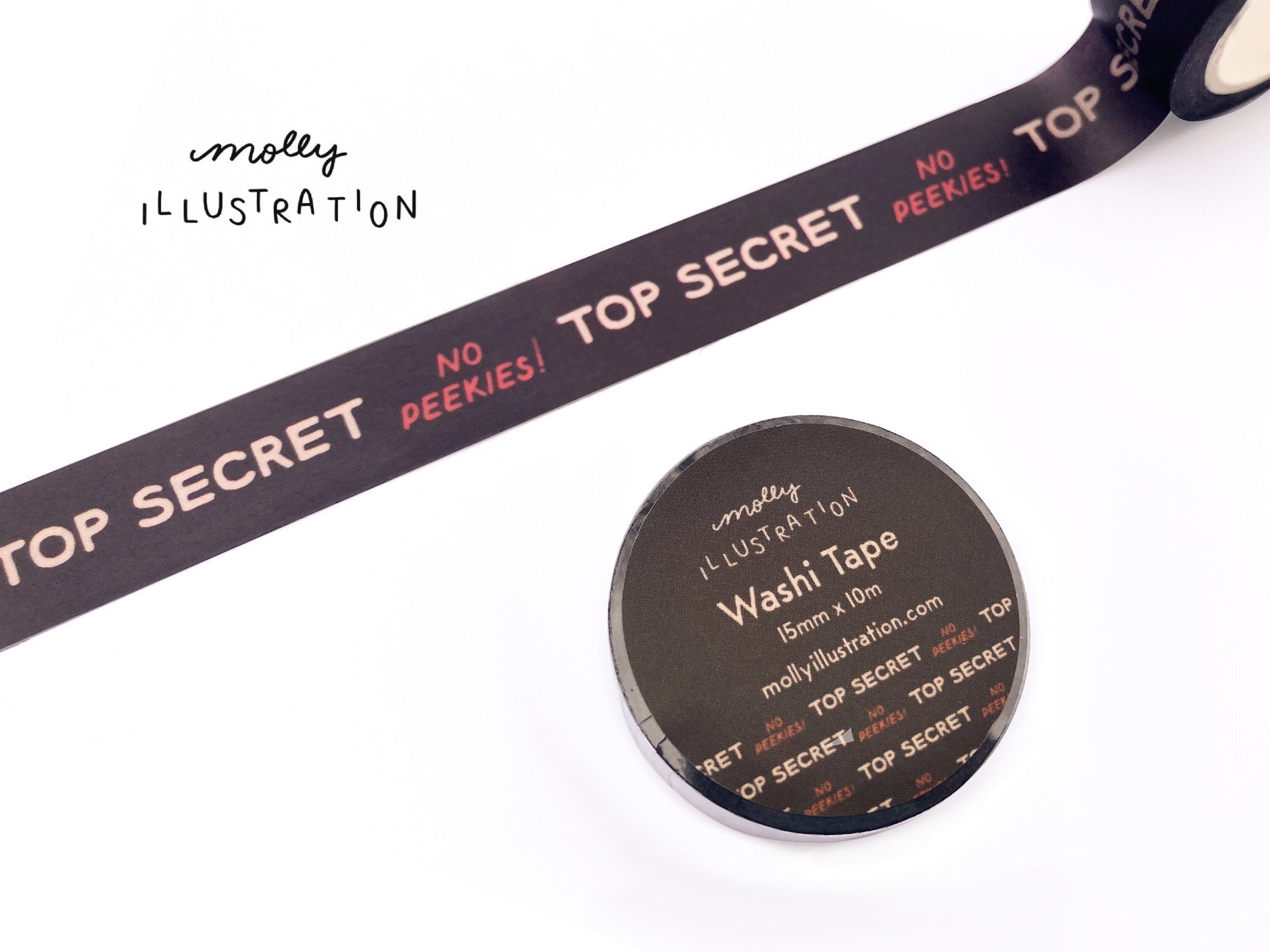 A roll of illustrated washi tape printed with the phrase “Top secret, No peekies!”