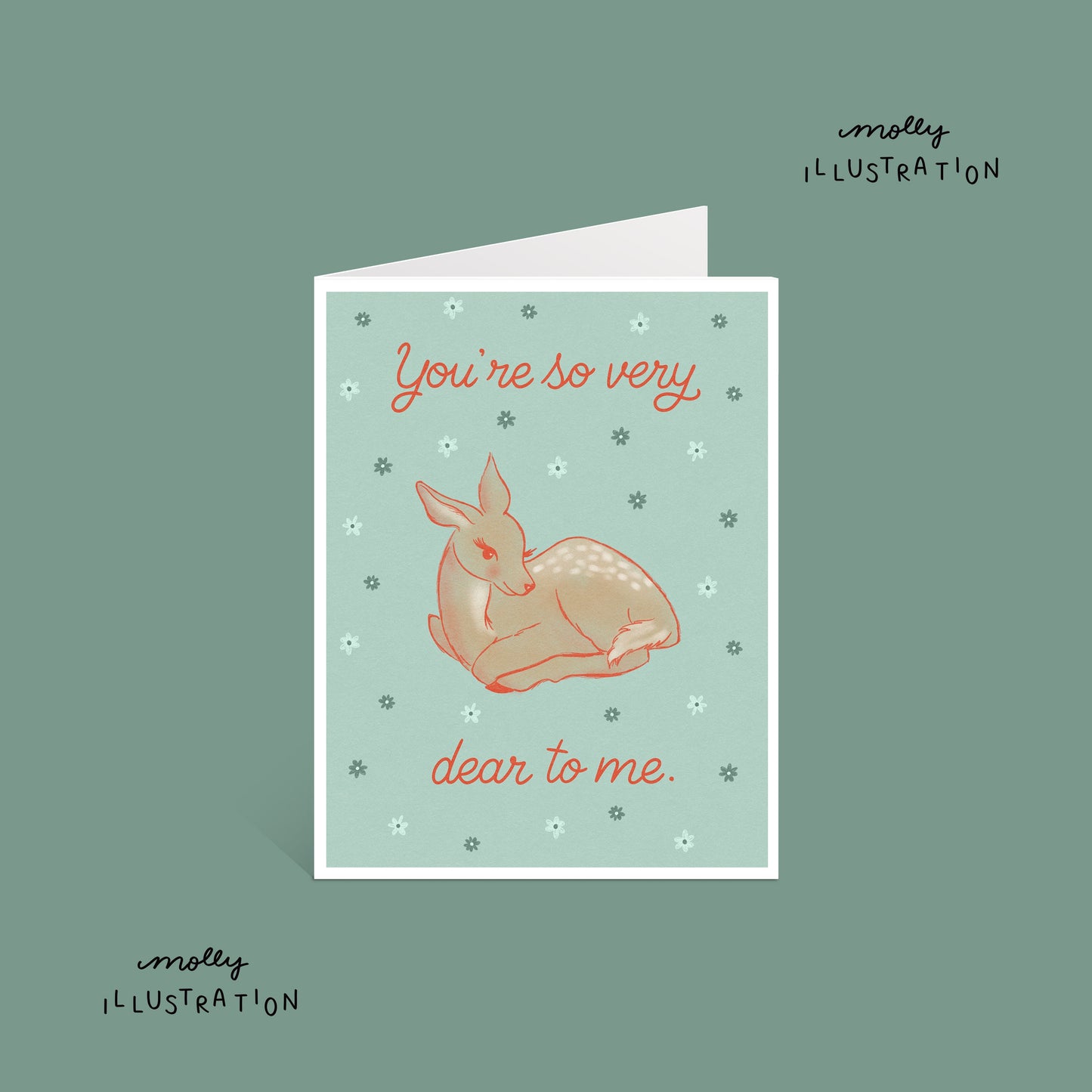 an illustrated greeting card that reads "you're so very dear to me" around a drawing of a brown deer with a blue background.